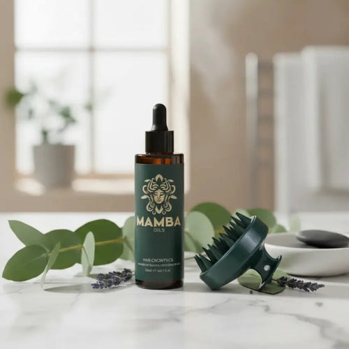 Mamba skincare bottle with brush on a marble surface with blurred background
